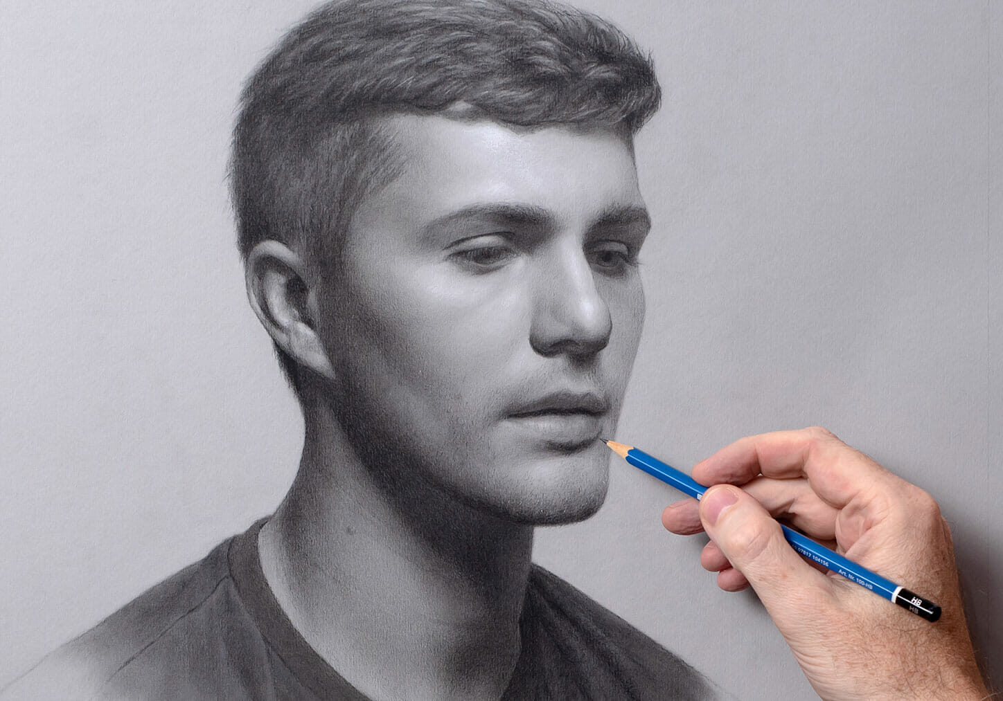 A graphite portrait drawing in progress.